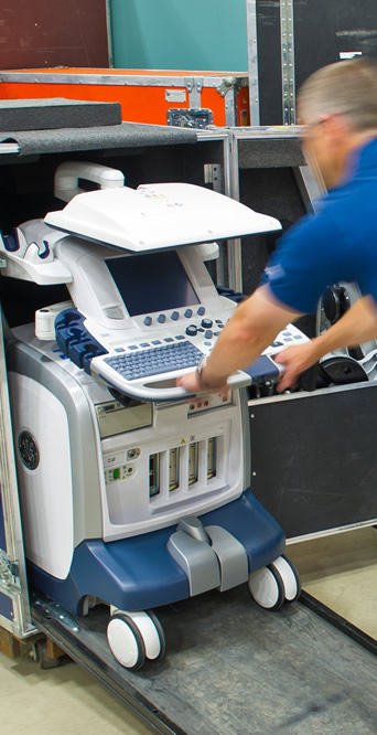 a person loading a medical device