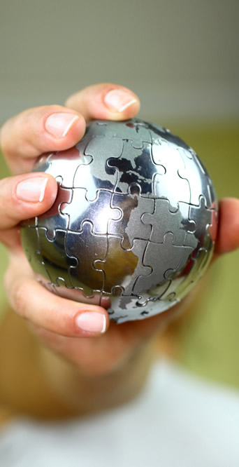 person holding a globe