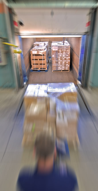 shipment is being loaded into a truck